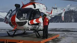 Alpine mountain rescue team on the front lines at first-aid station | AFP