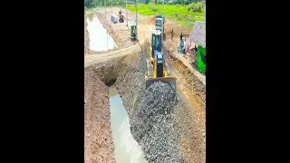 Earthmoving Mayhem: D60P Dozer Smashes Stone While Heavy Trucks Dump Big Loads