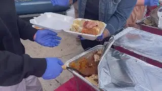 Volunteers in Panama City spread holiday cheer to the homeless