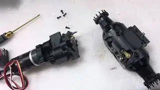 Curious about the inner workings of the LESU AOUE 1050 4x4 1/14 Hydraulic Metal RC Tractor?