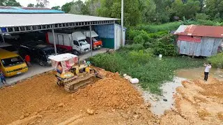 New Power Energy Bulldozer Operator Moving Dirt Dump Truck Unloading Dirt Processing Land Filling