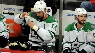 Jamie Benn taping his stick
