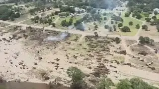 Searchers in helicopters scour Texas flood debris for the missing