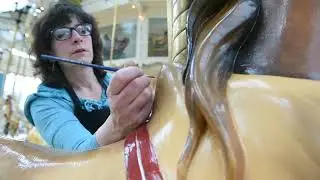 Touching up Destiny USA Mall's 1909 Philadelphia Toboggan Co. carousel
