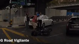 27feb2019  motorbike going straight in a turn right lane, hit the rear door of mercedes taxi