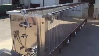 East Genesis 7 axle Unloader with Special Roll-Rite Mesh Tarp System