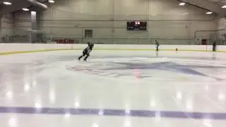 Ten year-old hockey player.  Big backwards crossovers.