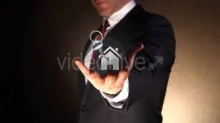 Real Estate Agent - stock footage of Realtor holding home keys