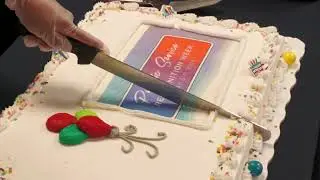 The Phoenix VA Veteran Canteen Service recognizes Pubic Service Week with a cake