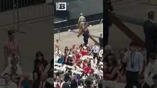 Giant Cross Carried into Stadium for Charlie Kirk Memorial