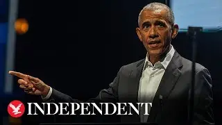 Barack Obama serenaded by choir on balcony as he visits Denmark