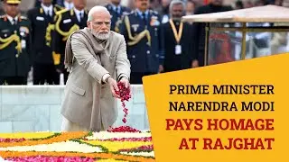 Prime Minister Narendra Modi pays homage at Rajghat