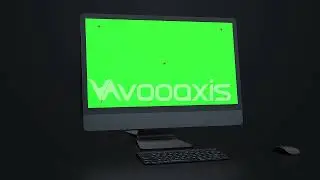 Two rotating desktop computer with green screen mockup in dark background