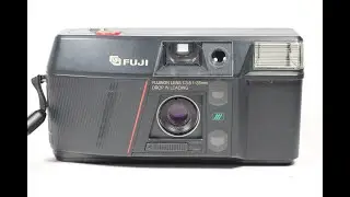 Fuji DL-150 35mm Point-&-Shoot Film Camera with F/3.5 35mm Lens Being Demonstrated