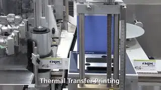 Labeler Topserter with Servo Orienting Wrap Belts - NJM Autocolt IV 326