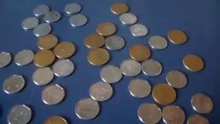 Moeda An&ocirc;mala de 10 e 25 centavos da 1&ordf; fam&iacute;lia do Real.