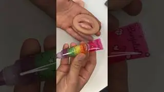 Applying Rainbow Lipgloss on Squishy Lips 🌈💄🫦 #shorts  #lips #lipgloss #mannequin #asmr #makeup