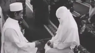 Muslim couple. Holding hands for the first time
