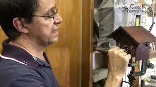 Restauração e conserto do relógio cuco suíço