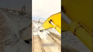 The process of digging a deep trench with an excavator