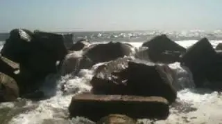 Running along the rocks on Venice Beach