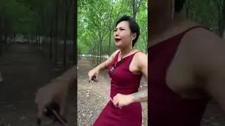 Target practice in woods with outdoors survival DANKUNG slingshot