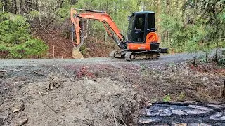 Storm damaged road repair with the Kubota KX 040 4