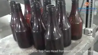 Semi Automatic Table Top Two head Peristaltic Filling Machine
