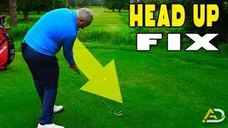 How to Stay DOWN Through IMPACT In The Golf Swing (head up fix)