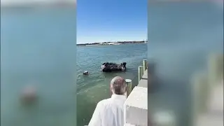 Video shows daring rescue after car goes into water at Back Deck, Bubba's