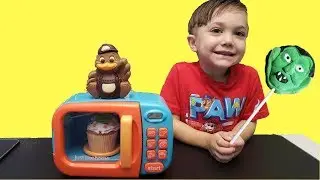 Zack playing with Just Like Home Magic Toy Microwave Oven Play Kitchen Set for kids!