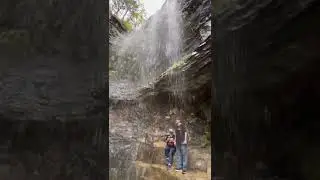 Behind the waterfall
