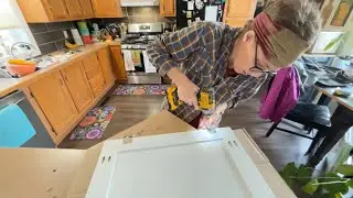Final Coats of Paint, Hinges & Installation (diy utility cabinet door)