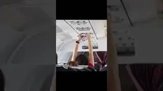 Crazy girl drying his underwear in plane