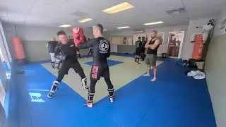 Muay Thai - blocking a jab/cross and throwing a 2 punch combo (cross-hook and hook-cross)