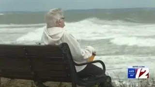 People flock to watch waves churned up by Hurricane Erin