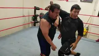 Jake Atlas working with student Oz