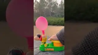 Blow up a balloon toy with your ass