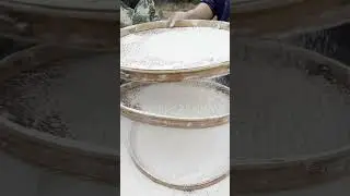 Hand-sifting flour, a dedication to traditional craftsmanship!