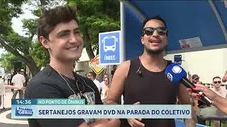 Country music artists record DVD at bus stop.