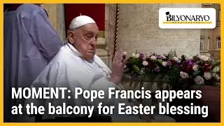 MOMENT: Pope Francis appears at the balcony for Easter blessing