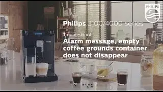 Empty coffee grounds container symbol does not disappear from my Philips espresso machine.