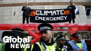 Climate change activists superglue themselves to London train