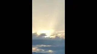 Sun rays behind clouds