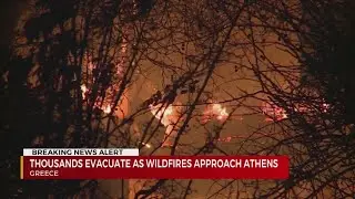 Thousands evacuate as wildfires approach Athens