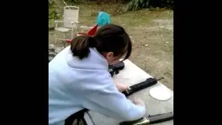 Rebecca shooting the Ruger 10/22 with ATI stock