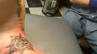 Jesse Camacho getting tattoo on neck @ tattoo Hous