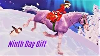 SSO OPENING THE NINTH DAY GIFT AT THE YULE TREE