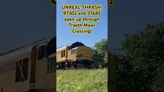 UNREAL THRASH! 97302 and 37685 open up through Traeth Mawr Crossing! #train #networkrail #railtour