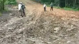 KLR 650 crossing the mud